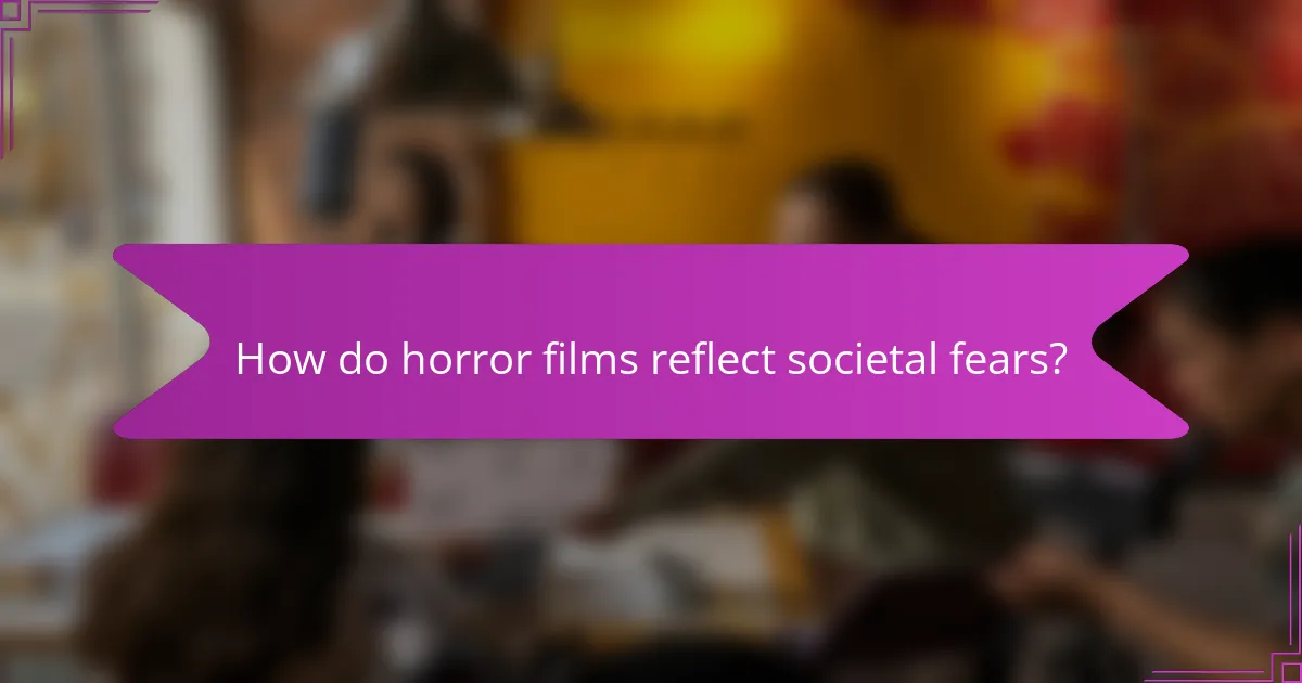 How do horror films reflect societal fears?